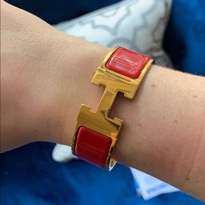Red and gold Hermès Clic Clac Bracelet